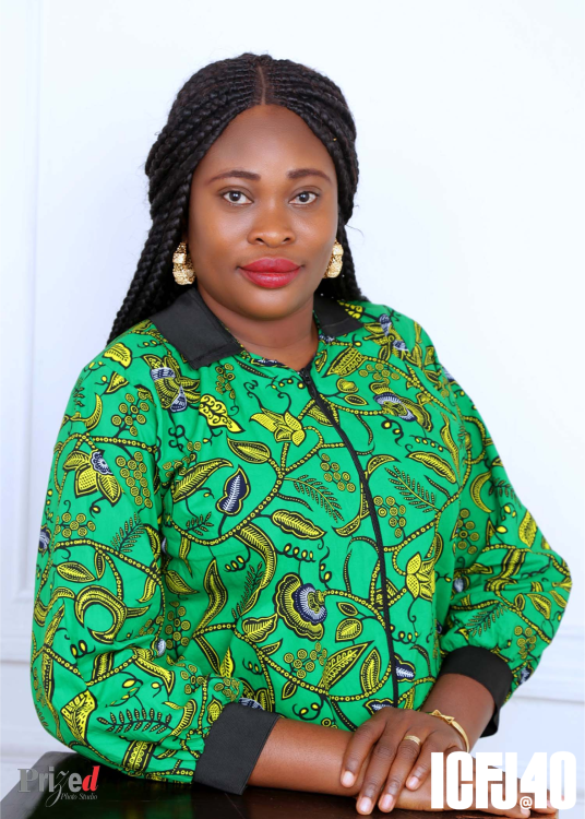 A headshot of Ojoma Akor against a white background.