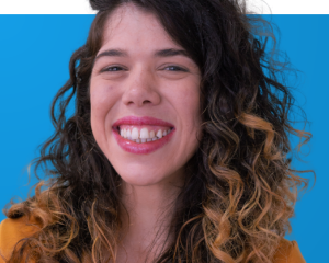 Portrait of Thayane Guimarães on blue background